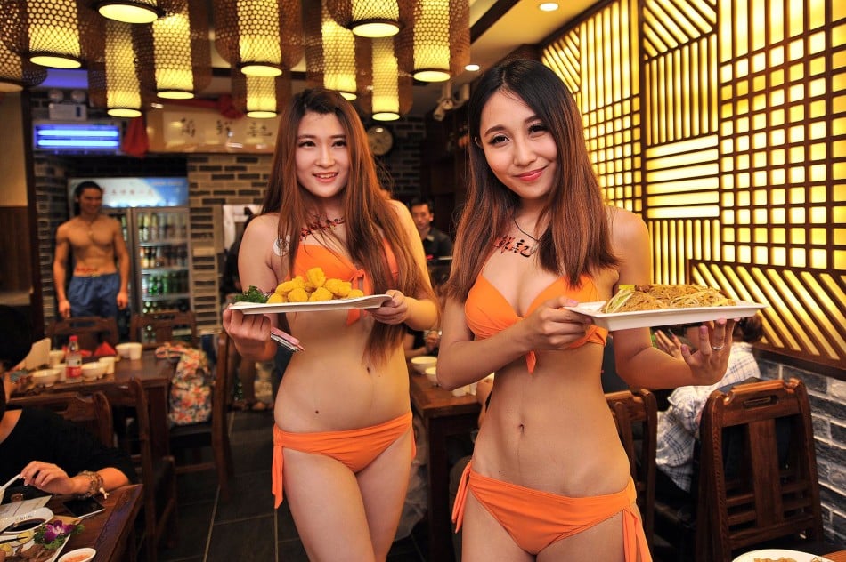 Would you like to have bikini-clad waitresses serving you food in a restaur...